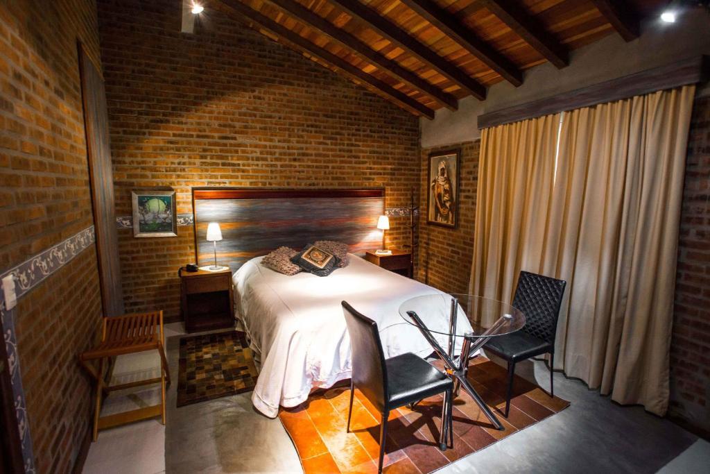 Pier 704 Hotel Canela Room photo