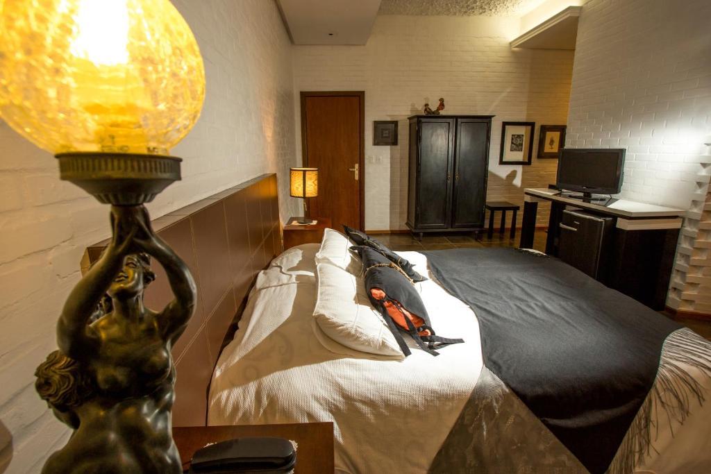 Pier 704 Hotel Canela Room photo