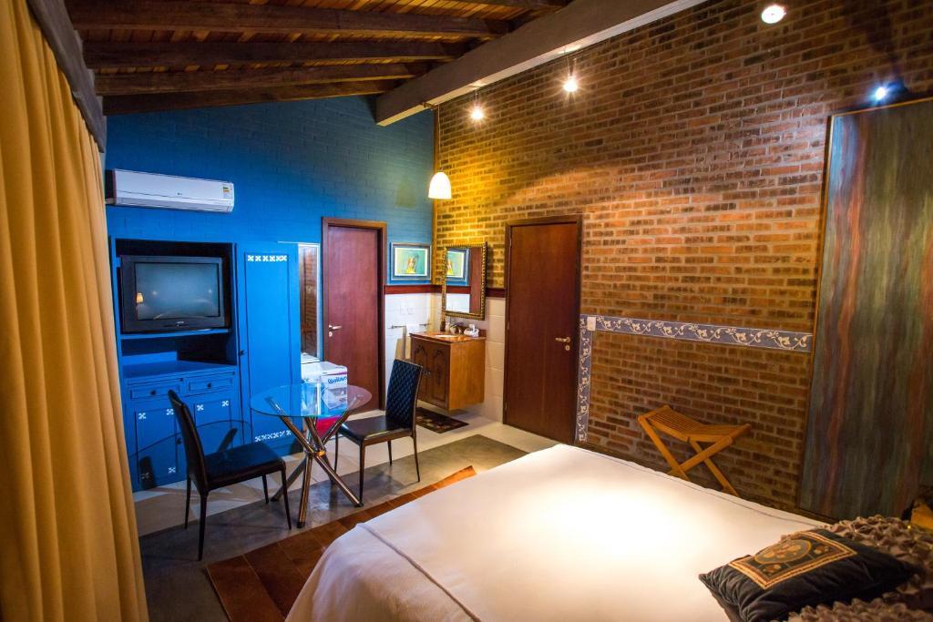Pier 704 Hotel Canela Room photo